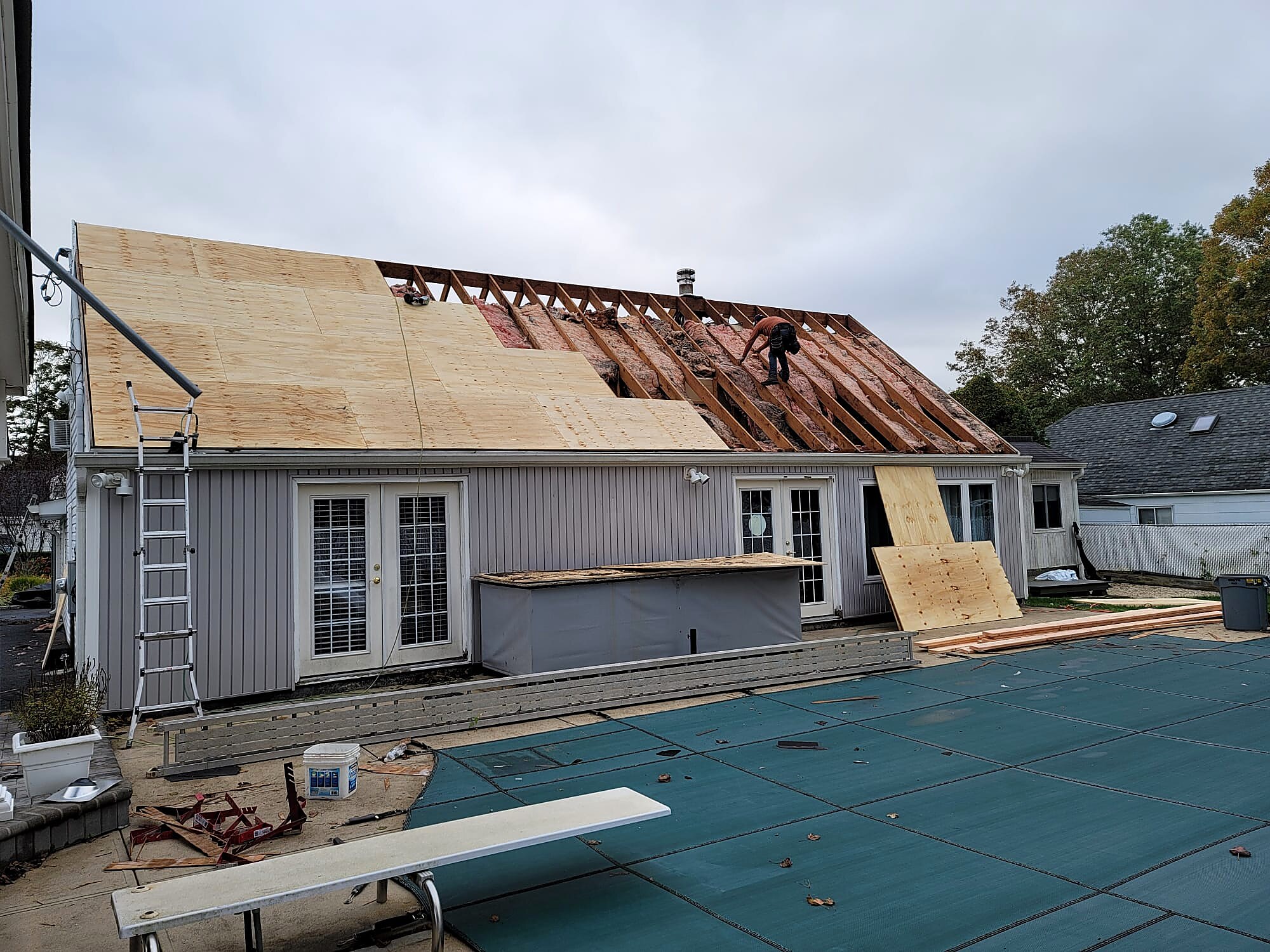 Roof framing and plywood sheathing in progress