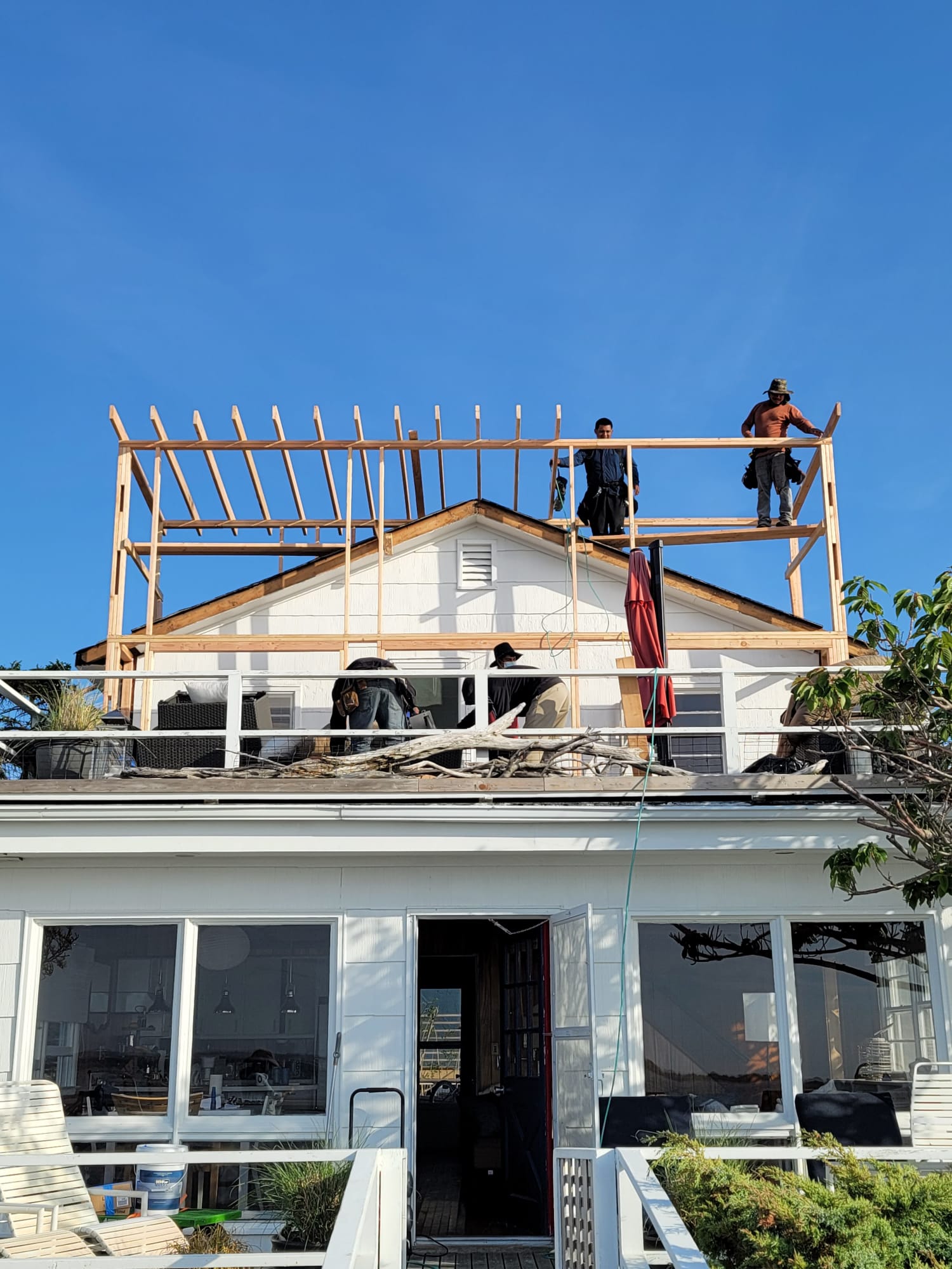 Crew framing a second-story addition